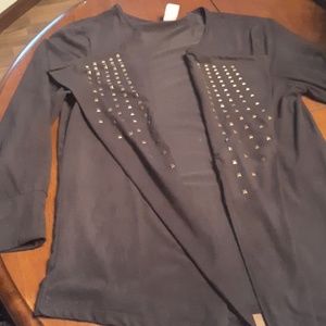 Brown sweater with brass emblems,